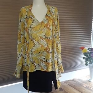 Yellow and brown sheer blouse